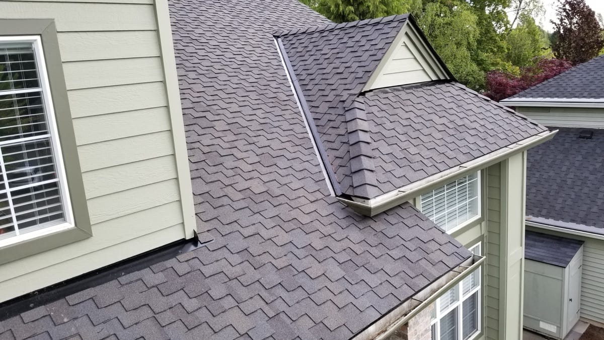 Close-up of a clean valley and dormer on a finished roof